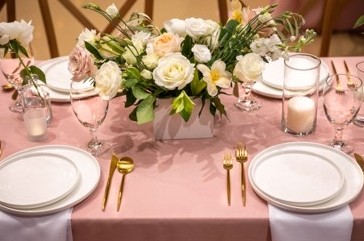 Wedding table with white and blush flowers
